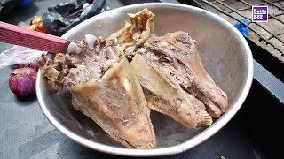 How to eat Goats Head in Nigeria [upl. by Ancier233]